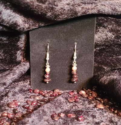 Red garnet earrings topped with freshwater pearl