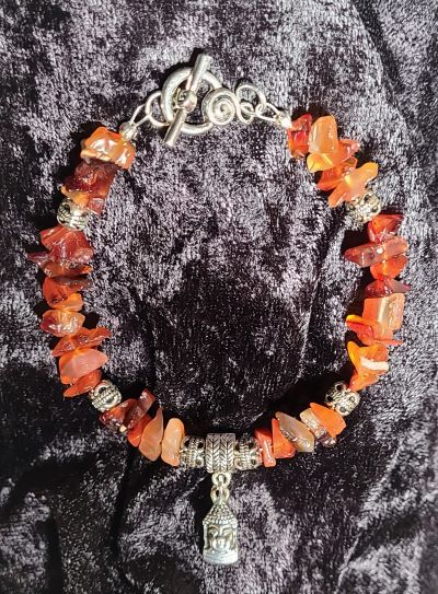 Carnelian bracelet with silver Buddha charm